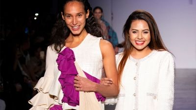 Model and designer on the catwalk at Regent's Graduate Fashion Show 2018