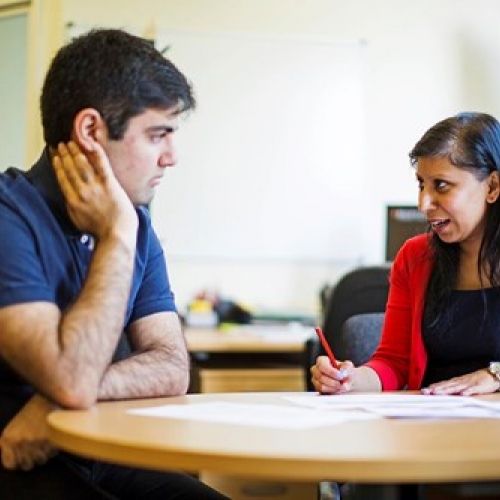 Student speaking to careers advisor