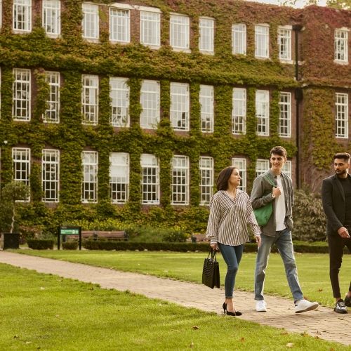 Students Tuke Lawn Campus